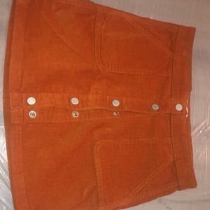Cute Orange skirt! Great for the fall time !